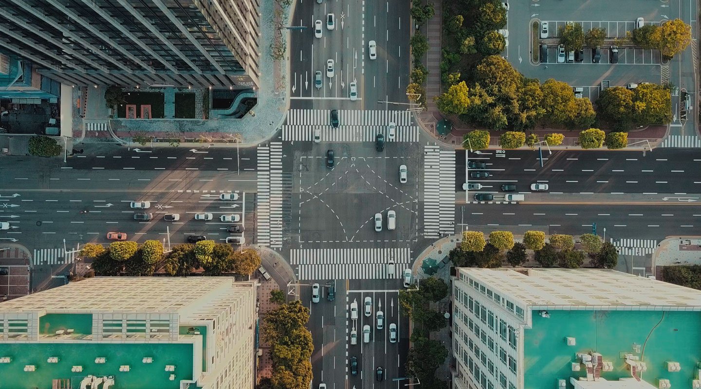 Aerial view of a busy city intersection in a diverse urban centre