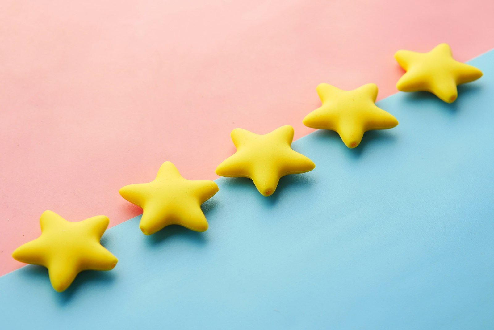 Five gold stars in a row, like a five-star customer review